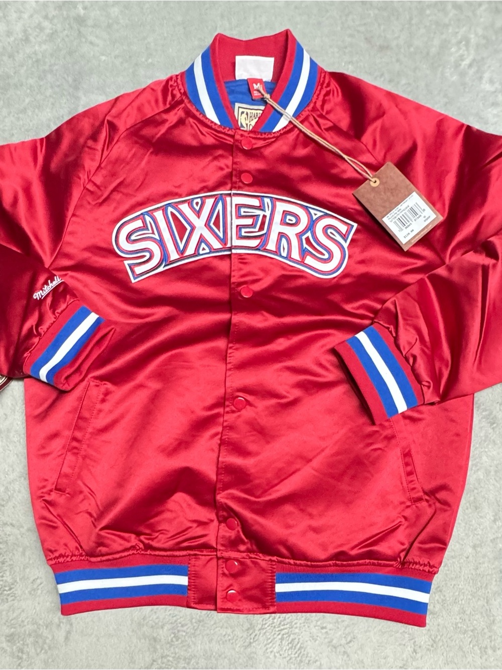 NWT Philadelphia 76ers Mitchell & Ness Sati Jacket Size M. Front Spellout Red.